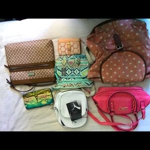 3 purses, 2 wallets, 1 medium and 1 Tiny back pack